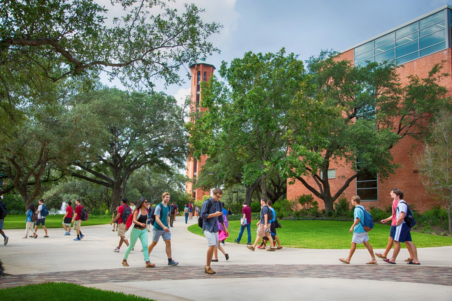 Photo of students walking outdoors through campus