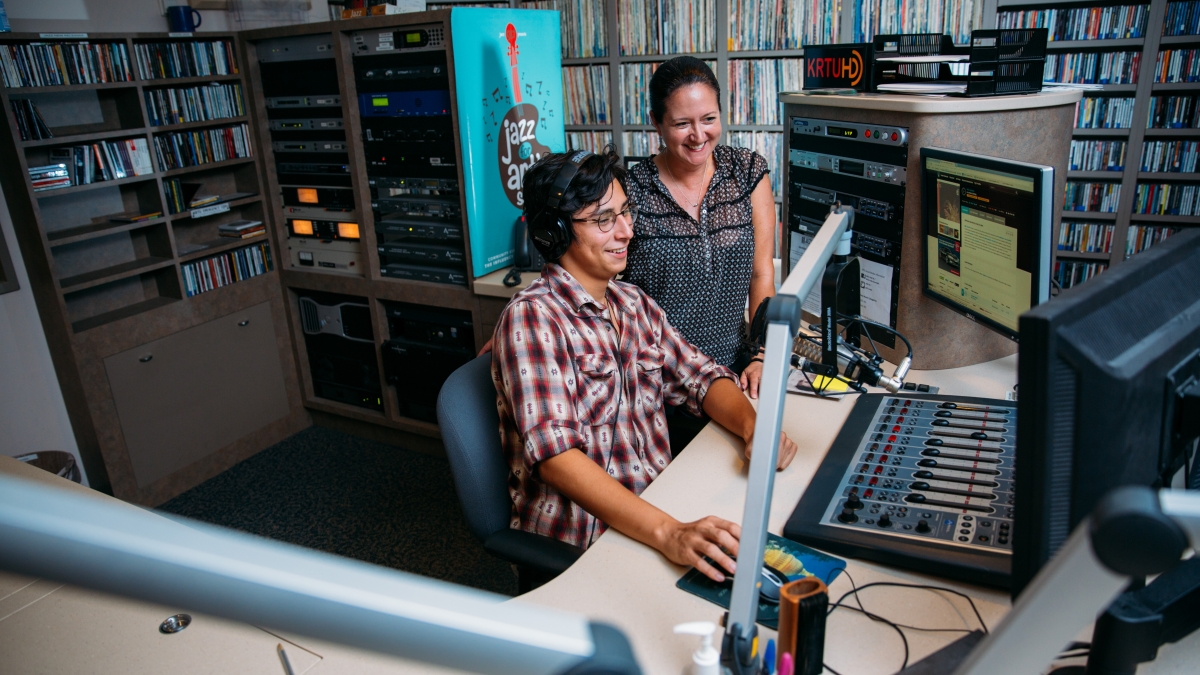 a professor and student in the KRTU recording studio